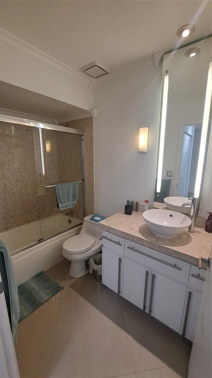 4519 Feivel Road, Unit 46 West Palm Beach, FL 33417 - Photo 38 of 56 a bathroom with a double vanity sink toilet and shower