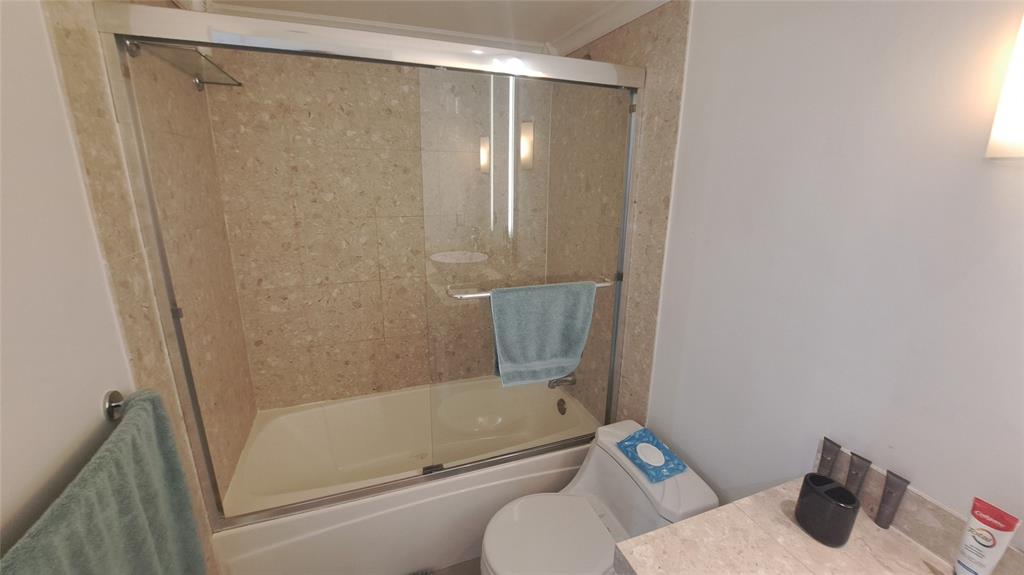 4519 Feivel Road, Unit 46 West Palm Beach, FL 33417 - Photo 39 of 56 a bathroom with a shower and a toilet