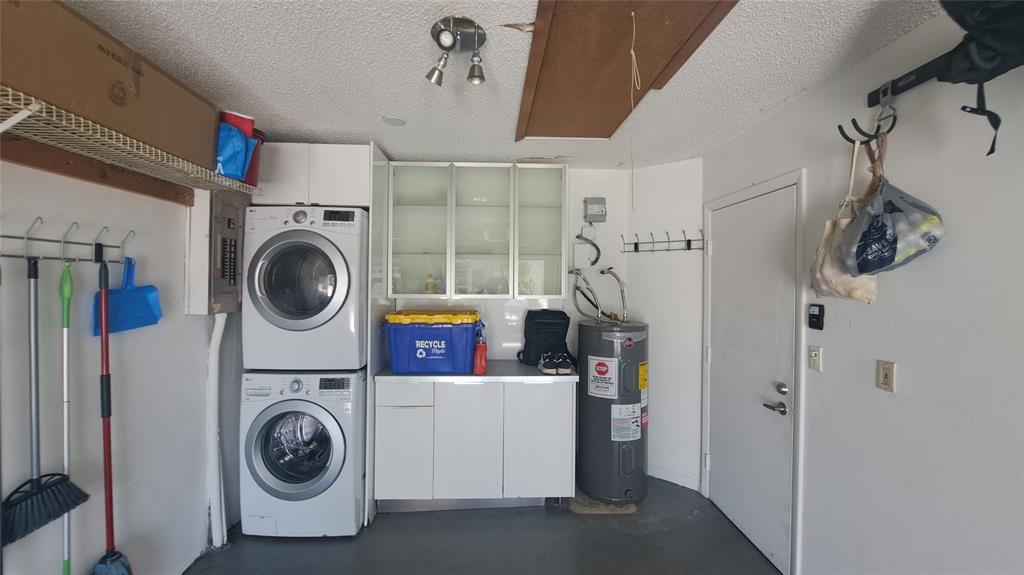 4519 Feivel Road, Unit 46 West Palm Beach, FL 33417 - Photo 41 of 56 a utility room with dryer and washer