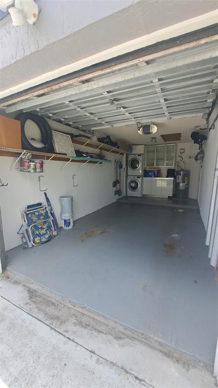 4519 Feivel Road, Unit 46 West Palm Beach, FL 33417 - Photo 42 of 56 a view of a garage with storage