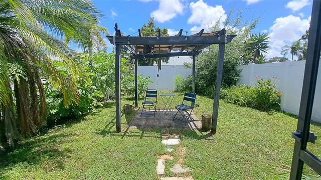 a view of a terrace with furniture