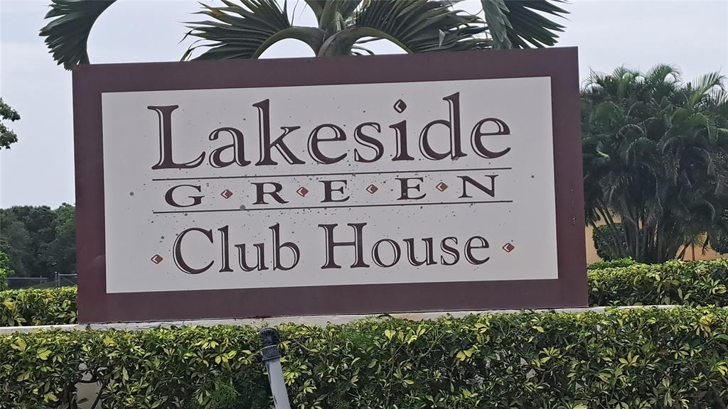 4519 Feivel Road, Unit 46 West Palm Beach, FL 33417 - Photo 49 of 56 a sign broad on the wall