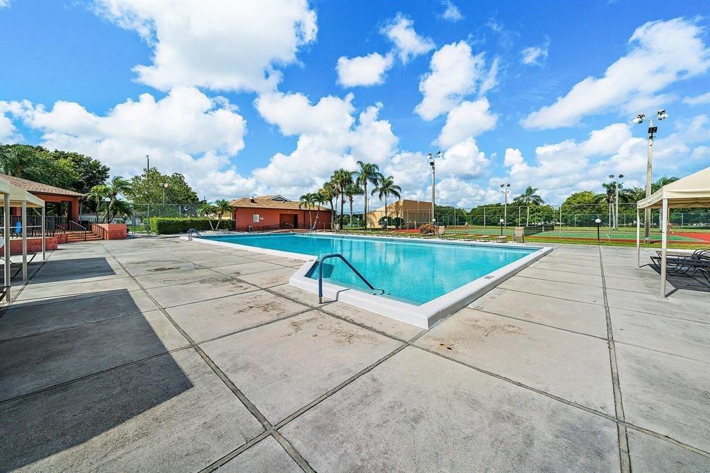 4519 Feivel Road, Unit 46 West Palm Beach, FL 33417 - Photo 51 of 56 a view of outdoor space with seating