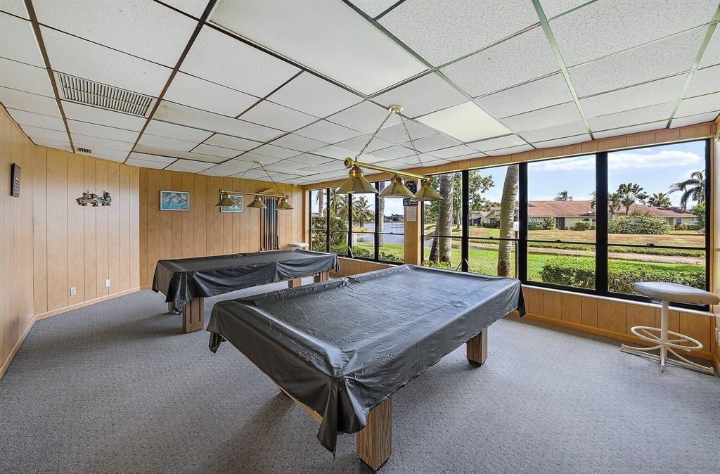 4519 Feivel Road, Unit 46 West Palm Beach, FL 33417 - Photo 56 of 56 a room with pool table and windows