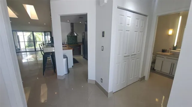 a kitchen with stainless steel appliances a refrigerator and a stove