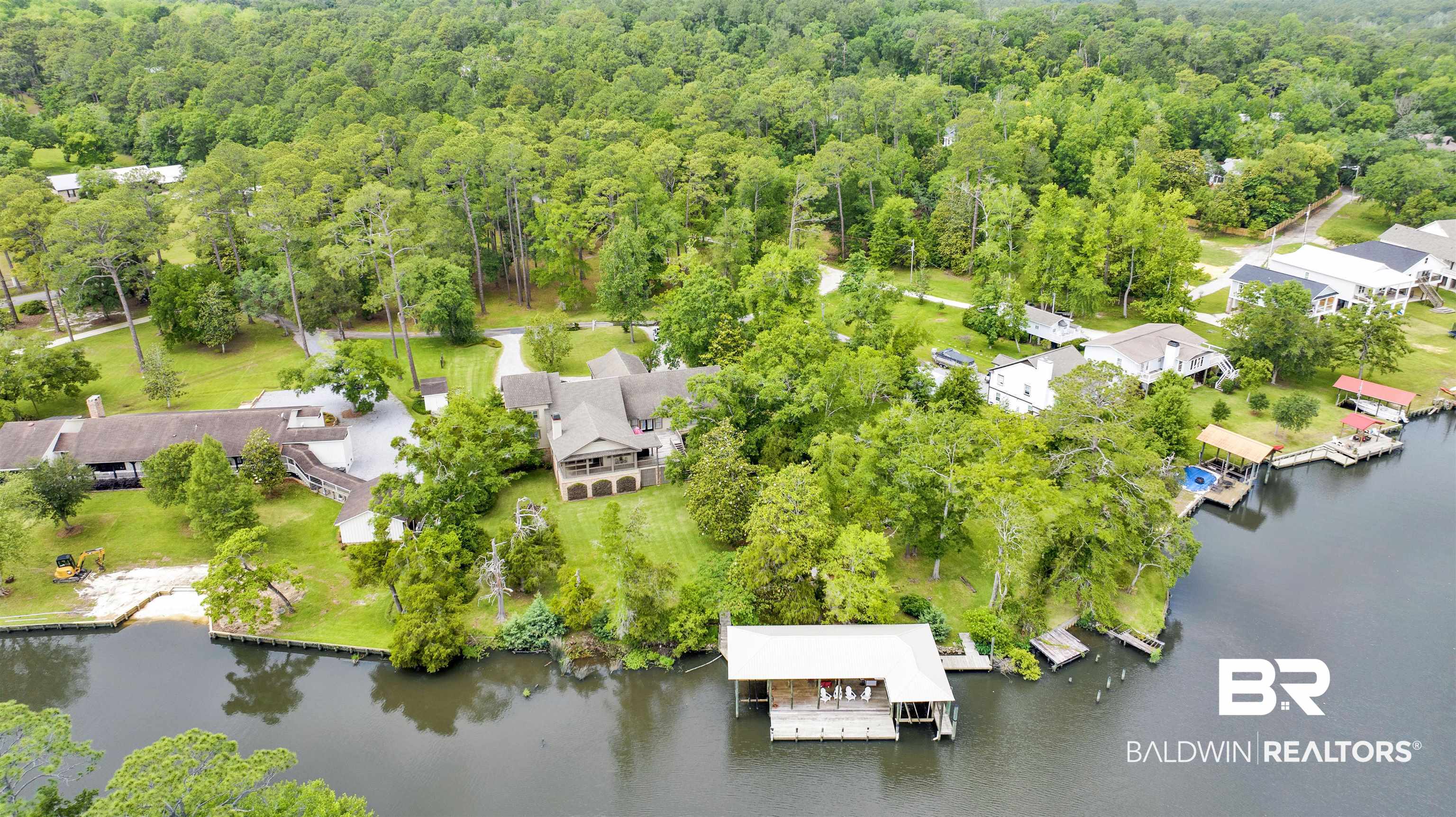 16864 Ferry Rd Circle Fairhope, AL 36532 - Photo 67 of 68 Aerial perspective of suburban area featuring a forest and a large body of water