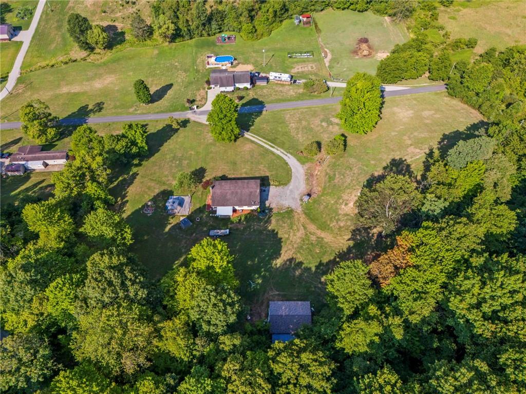 218 Gwynn Road Jefferson, PA 15344 - Photo 12 of 32 an aerial view of a house with a yard swimming pool outdoor seating and yard