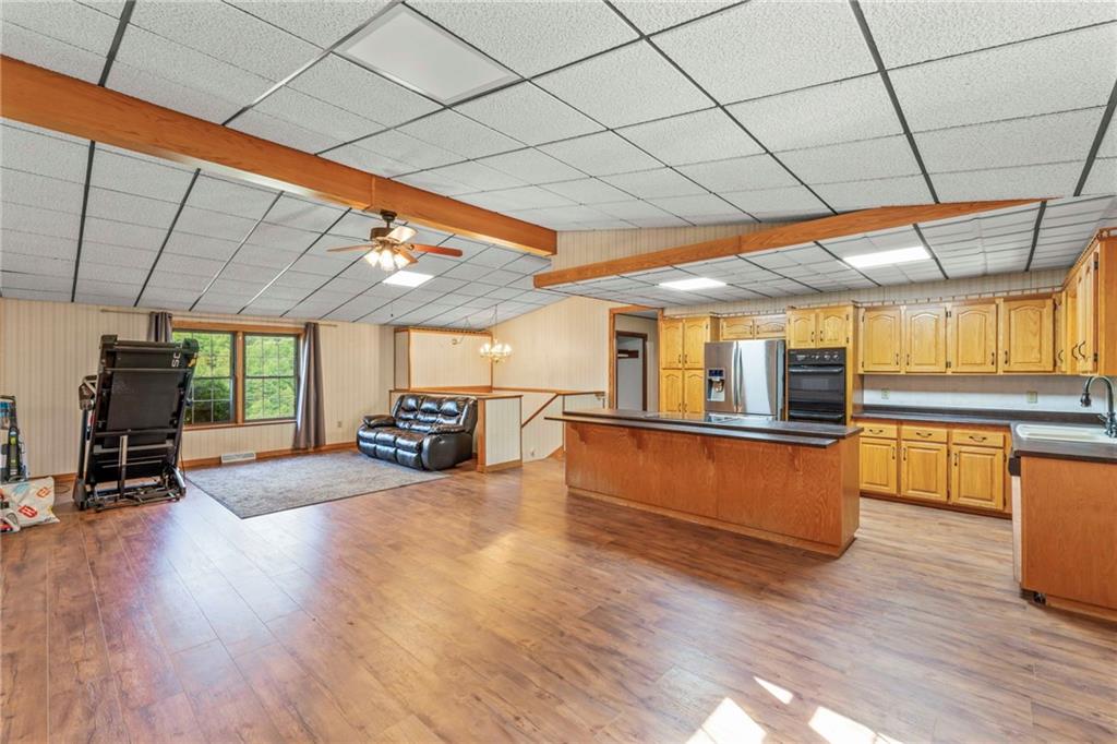 218 Gwynn Road Jefferson, PA 15344 - Photo 18 of 32 a view of a room with wooden floor