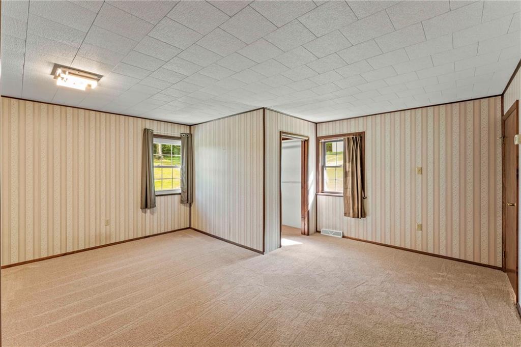 218 Gwynn Road Jefferson, PA 15344 - Photo 23 of 32 an empty room with windows
