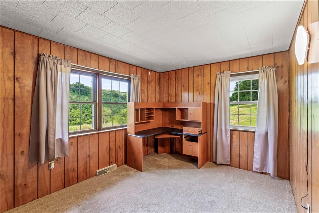 218 Gwynn Road Jefferson, PA 15344 - Photo 29 of 32 a view of a kitchen with large windows and refrigerator