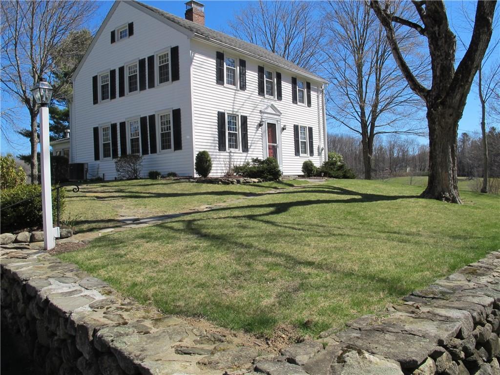 306 Milton Road Litchfield, CT 06759 - Photo 1 of 1 a front view of a house with a yard