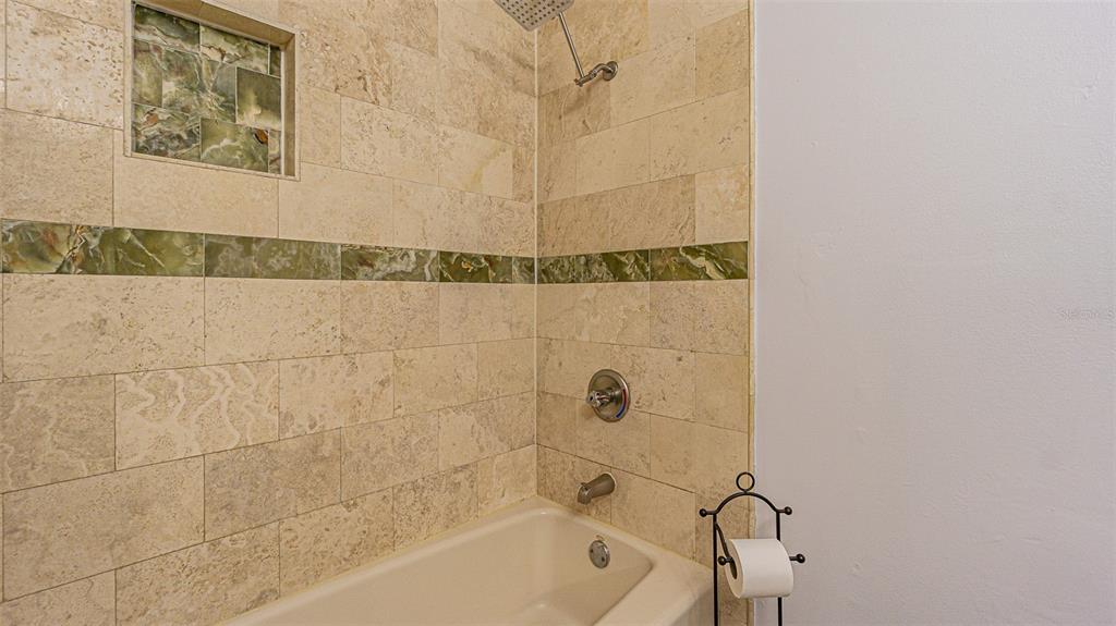 3801 Durant Road Valrico, FL 33596 - Photo 16 of 53 a bathroom with a bathtub