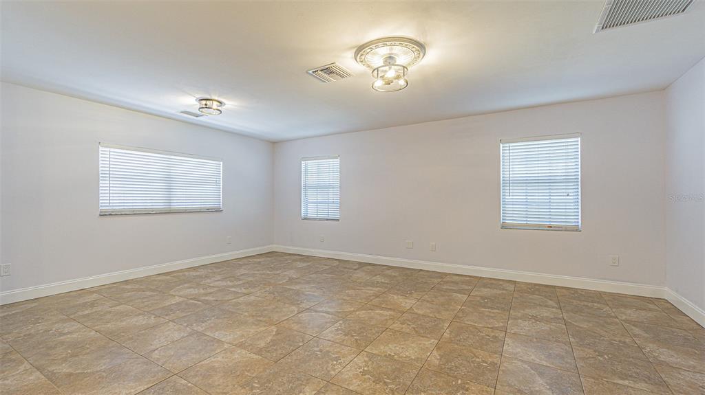 3801 Durant Road Valrico, FL 33596 - Photo 21 of 53 a view of an empty room with a window