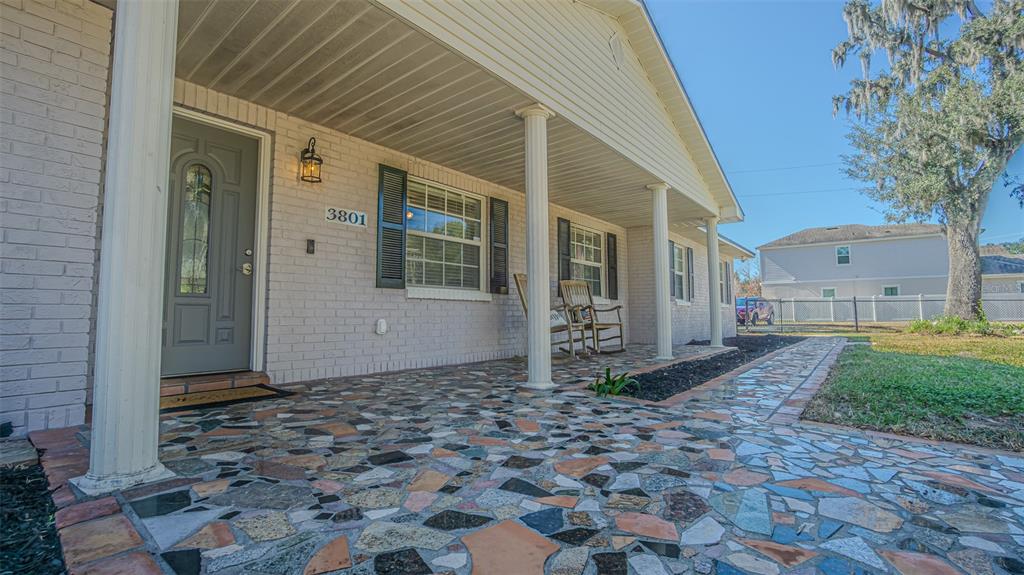 3801 Durant Road Valrico, FL 33596 - Photo 25 of 53 a front view of a house with a yard