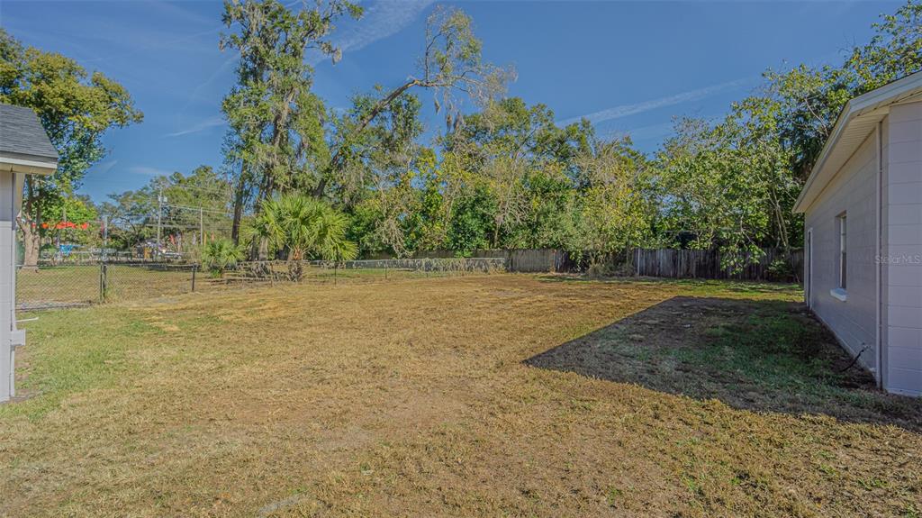 3801 Durant Road Valrico, FL 33596 - Photo 38 of 53 a view of a garden with trees