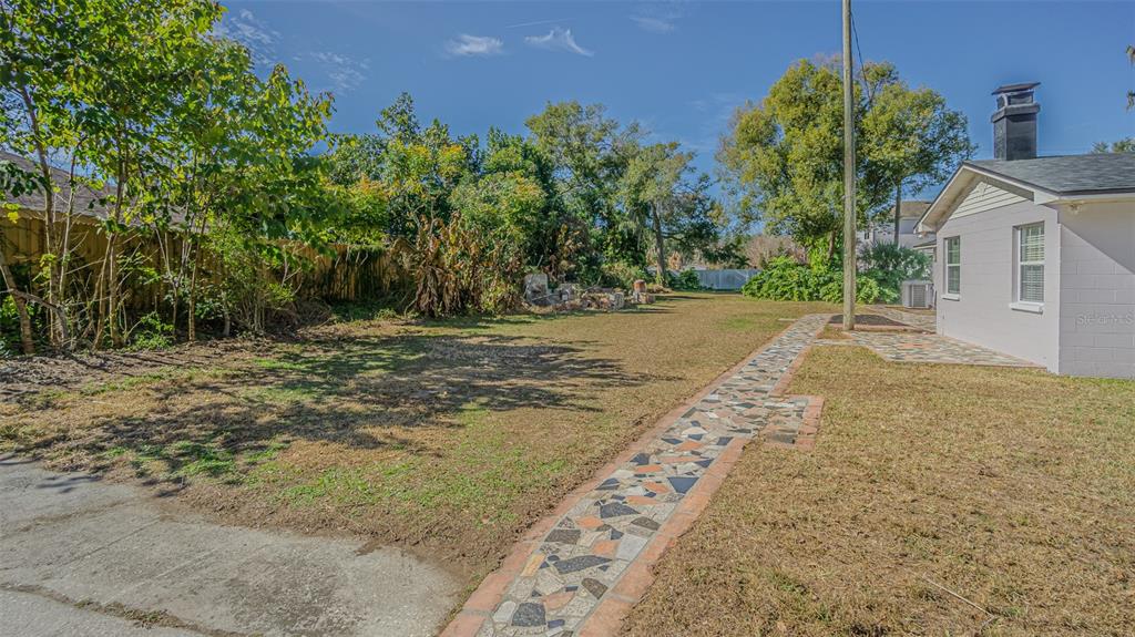 3801 Durant Road Valrico, FL 33596 - Photo 40 of 53 a view of a backyard of a house
