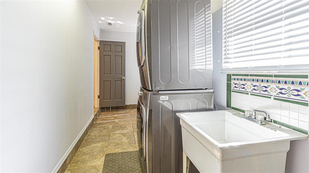 3801 Durant Road Valrico, FL 33596 - Photo 50 of 56 a view of a bathroom with a sink and a window