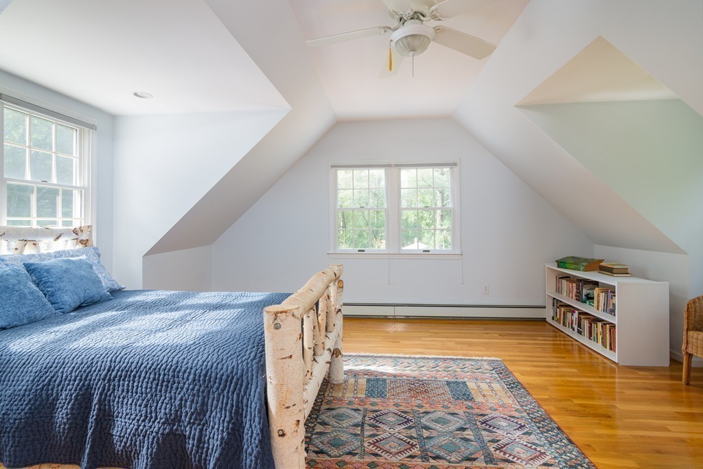 95 Pine Street Medfield, MA 02052 - Photo 24 of 30 a bedroom with a bed and a window