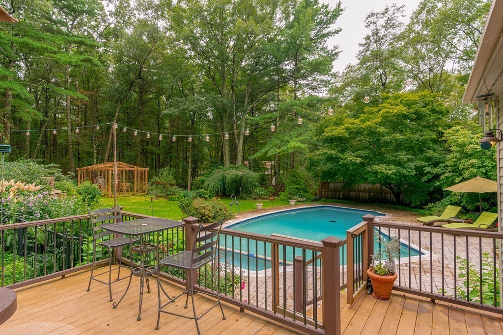 95 Pine Street Medfield, MA 02052 - Photo 27 of 30 a view of a patio with two chairs and a table