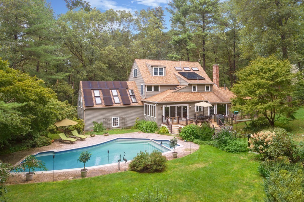 95 Pine Street Medfield, MA 02052 - Photo 29 of 30 a aerial view of a house with a yard table and chairs