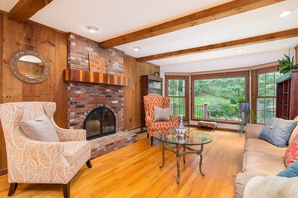 95 Pine Street Medfield, MA 02052 - Photo 4 of 30 a living room with furniture and a fireplace