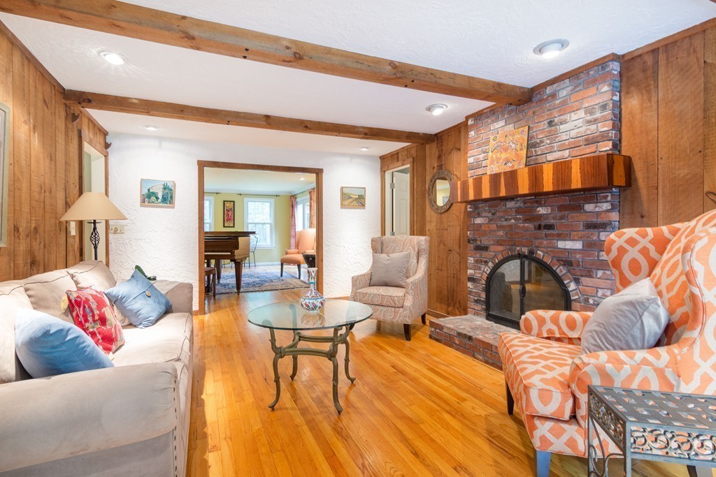 95 Pine Street Medfield, MA 02052 - Photo 5 of 30 a living room with furniture and a fireplace