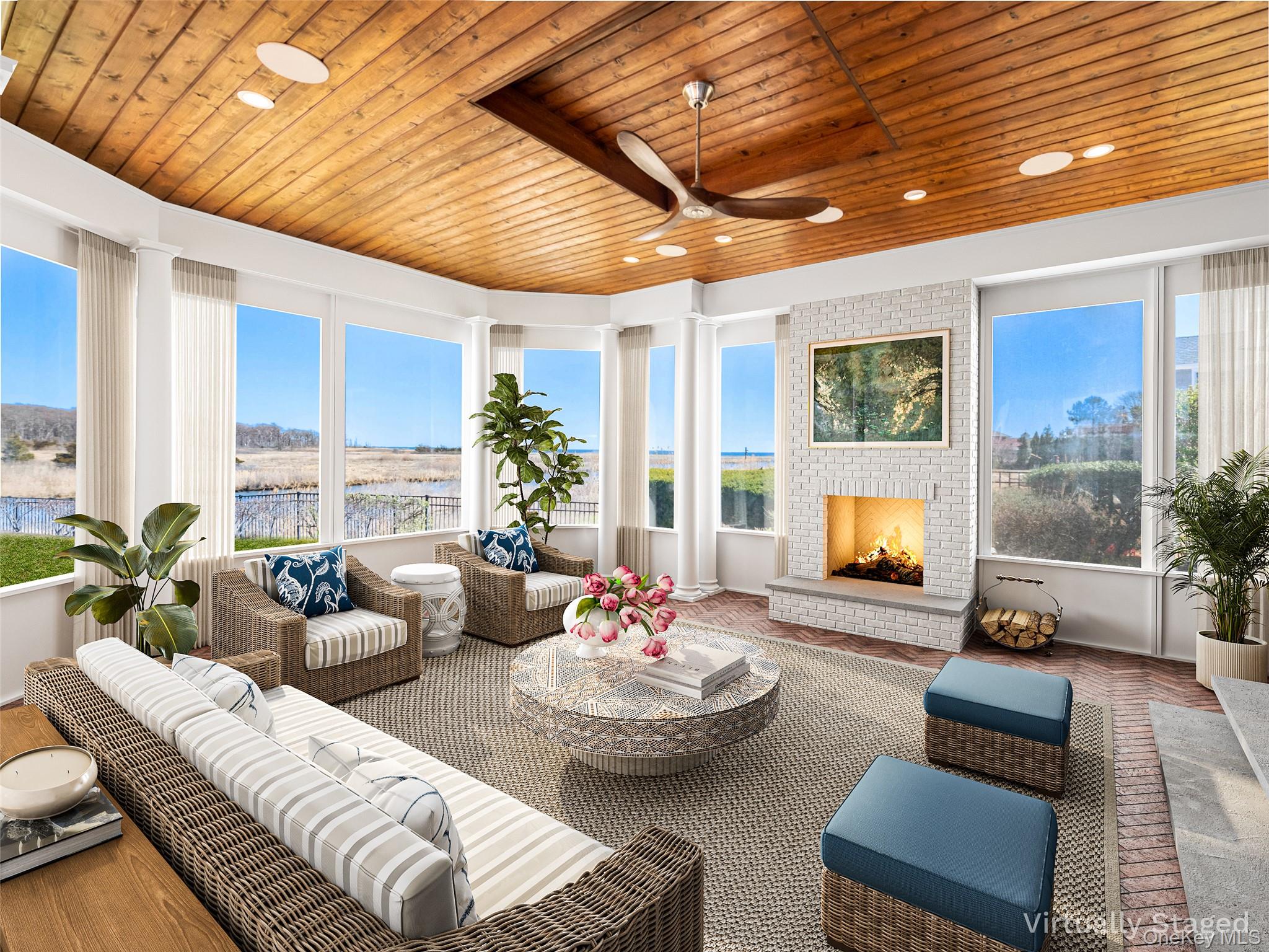 27 True Harbour Way West Islip, NY 11795 - Photo 11 of 26 a living room with furniture and a fireplace