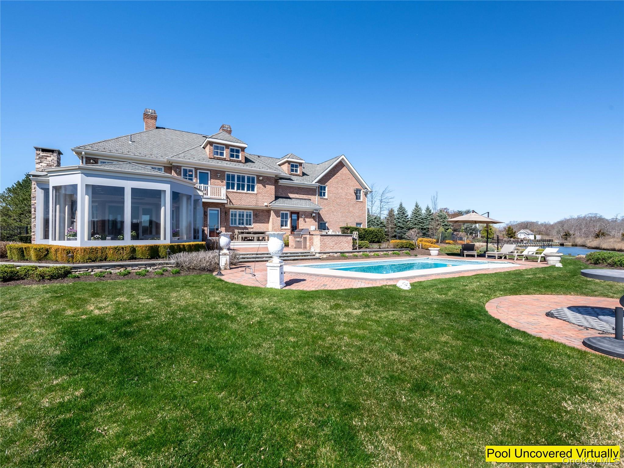 27 True Harbour Way West Islip, NY 11795 - Photo 21 of 26 a front view of a house with a yard