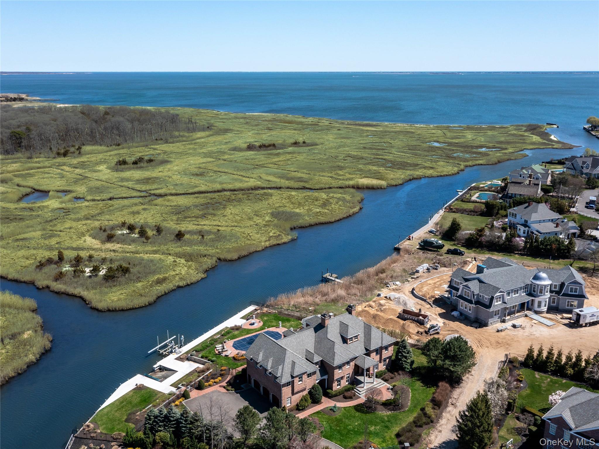 27 True Harbour Way West Islip, NY 11795 - Photo 24 of 26 a view of an ocean and beach