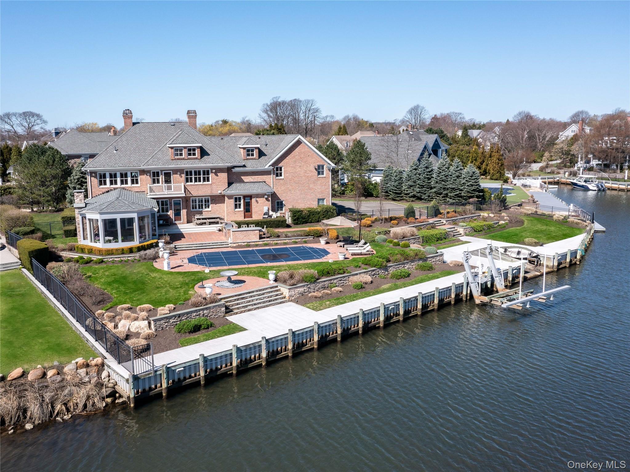 27 True Harbour Way West Islip, NY 11795 - Photo 4 of 26 an aerial view of a house with a ocean view