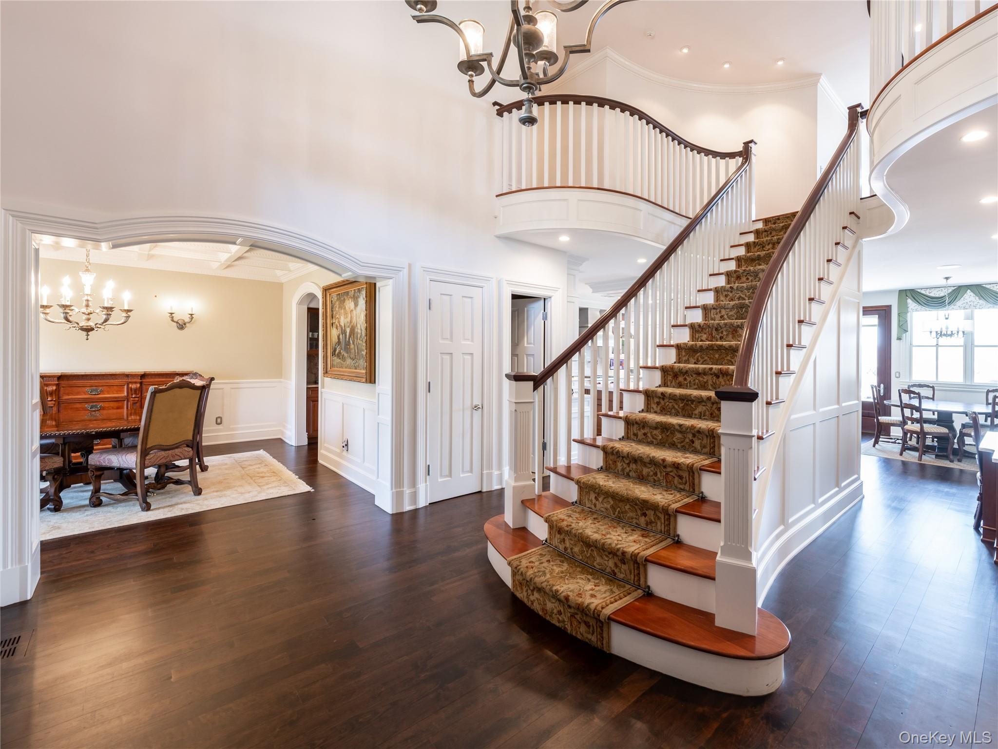 27 True Harbour Way West Islip, NY 11795 - Photo 7 of 26 a view of entryway with dining room and wooden floor