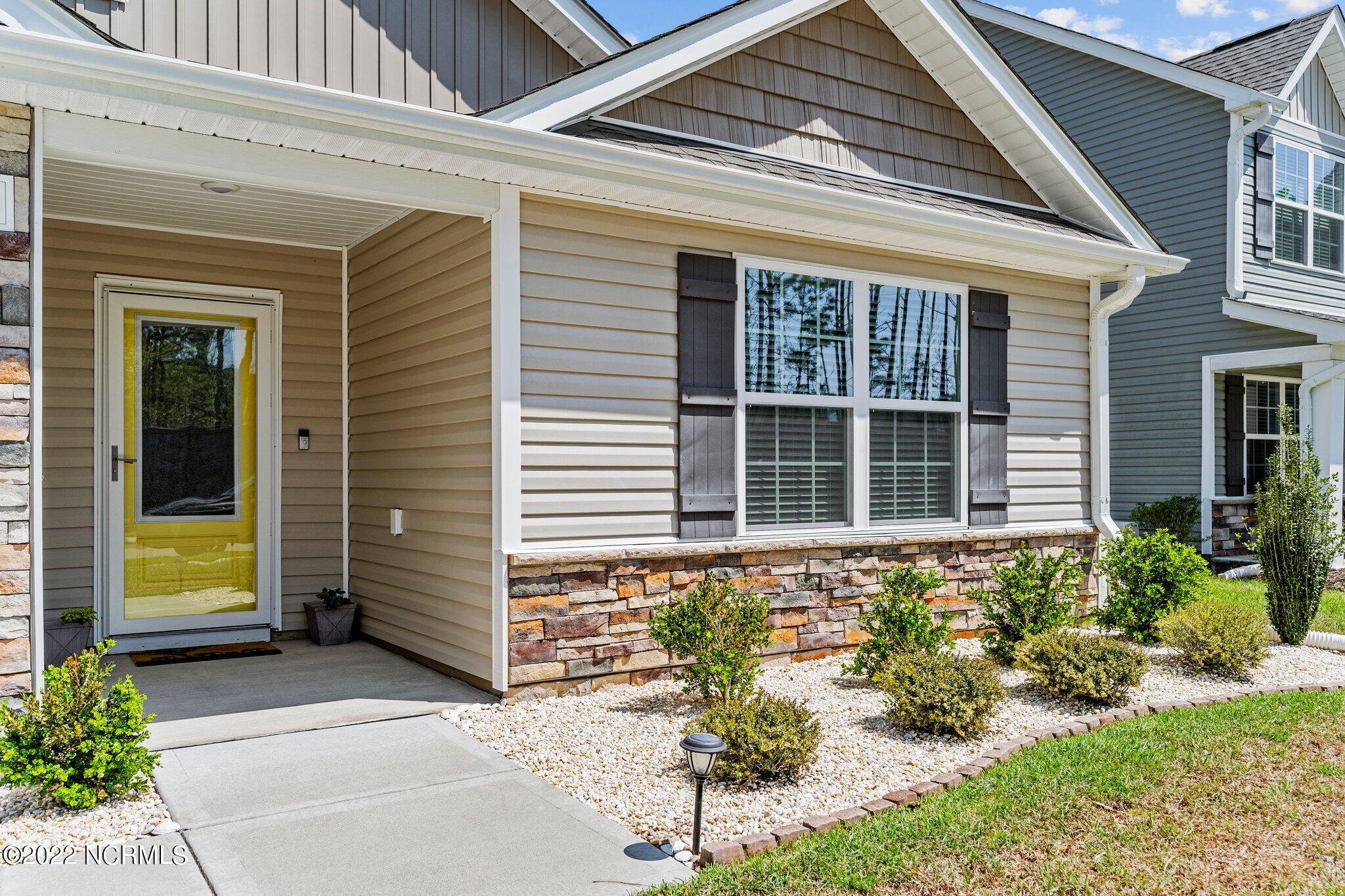 680 Aurora Place Hampstead, NC 28443 - Photo 2 of 35 Front of Home