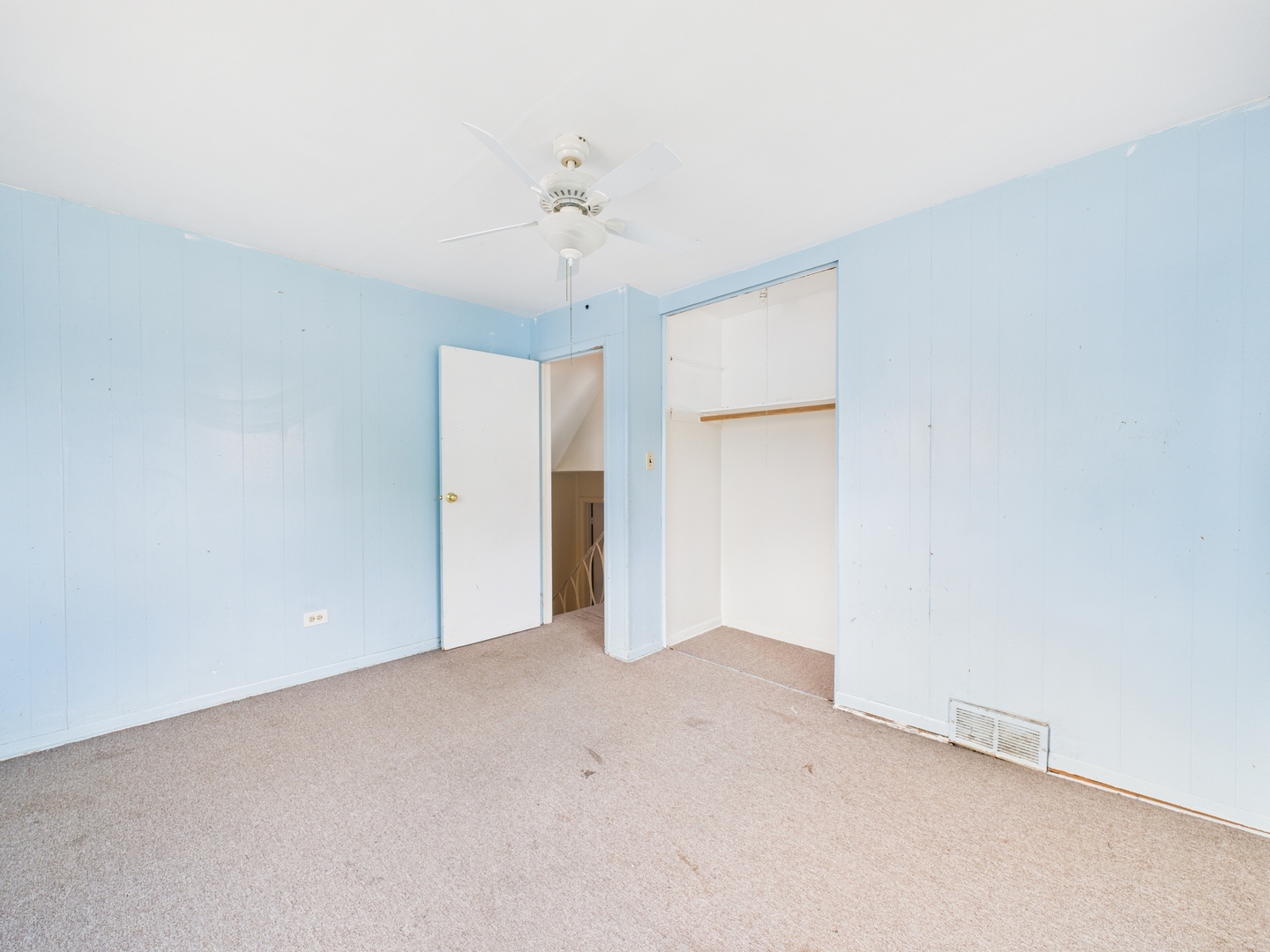 235 32nd Avenue Bellwood, IL 60104 - Photo 15 of 24 an empty room with a empty space and a ceiling fan