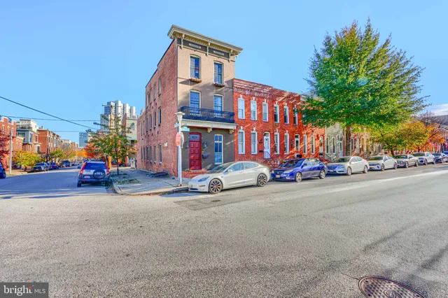a view of a street with cars