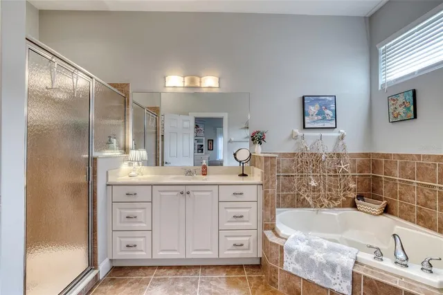 a bedroom with a bed and cabinets