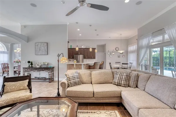 a backyard of a house with lots of green space and lake view