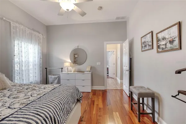 an aerial view of a house with a garden and swimming pool