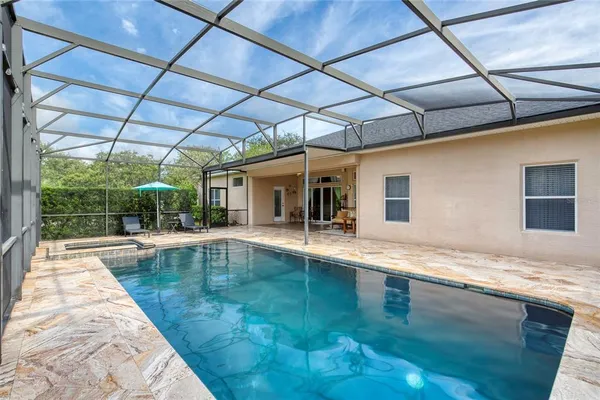 a house with river in front of it