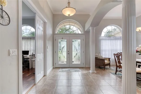 a kitchen with stainless steel appliances granite countertop a refrigerator stove and sink