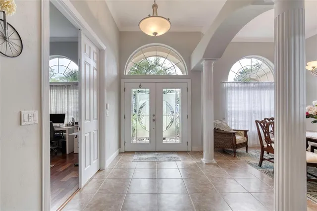 a kitchen with stainless steel appliances granite countertop a refrigerator stove and sink