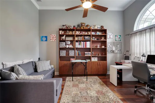 a large kitchen with a table and chairs