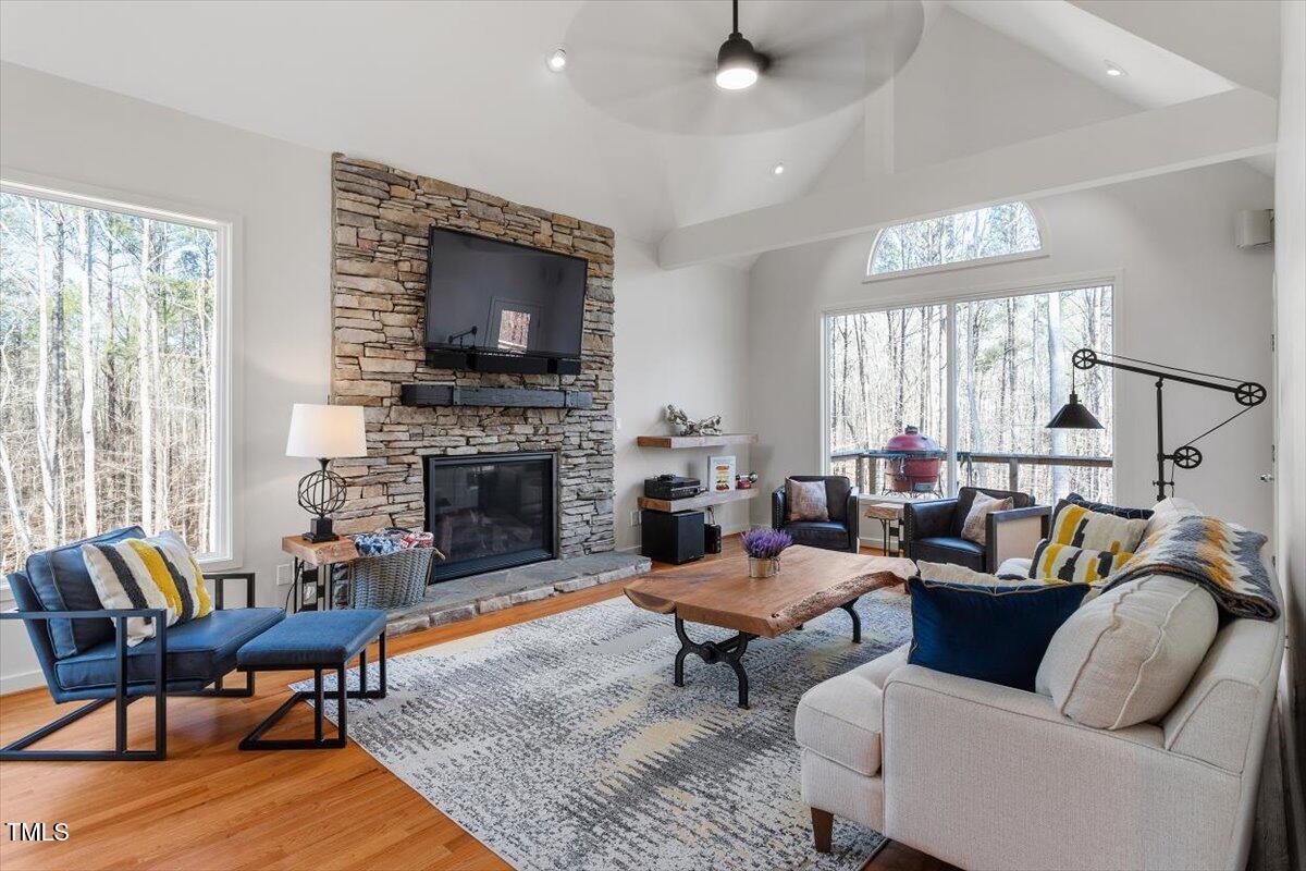 5920 Orchid Valley Road Raleigh, NC 27613 - Photo 15 of 54 Living Room featuring new Majestic Quartz fireplace with remote