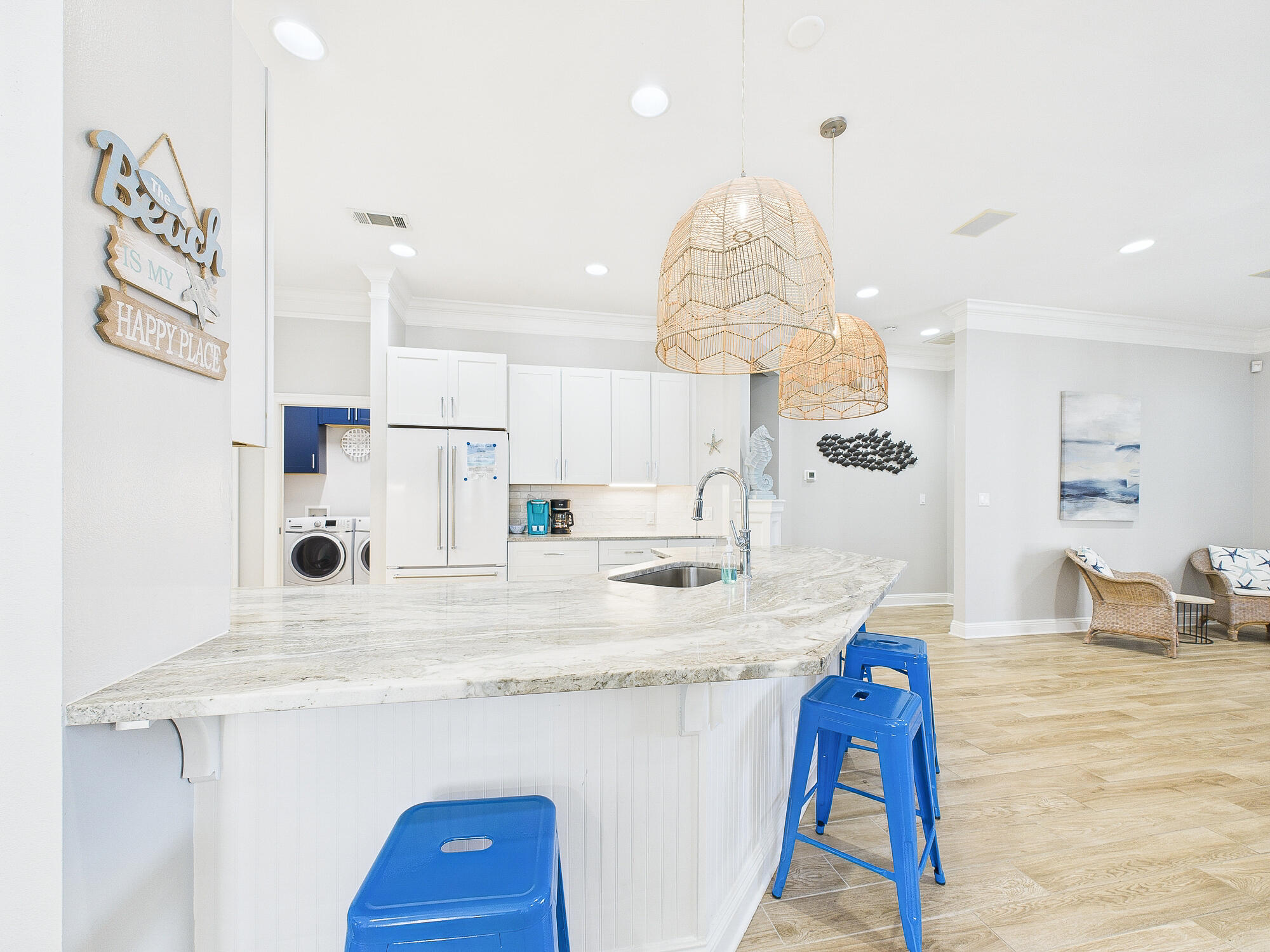 4634 Sunset Pointe Destin, FL 32541 - Photo 14 of 68 a kitchen with a sink a refrigerator and a view of living room