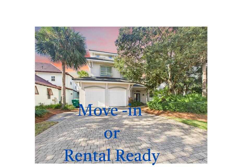 4634 Sunset Pointe Destin, FL 32541 - Photo 2 of 68 a view of a street with a building in the background