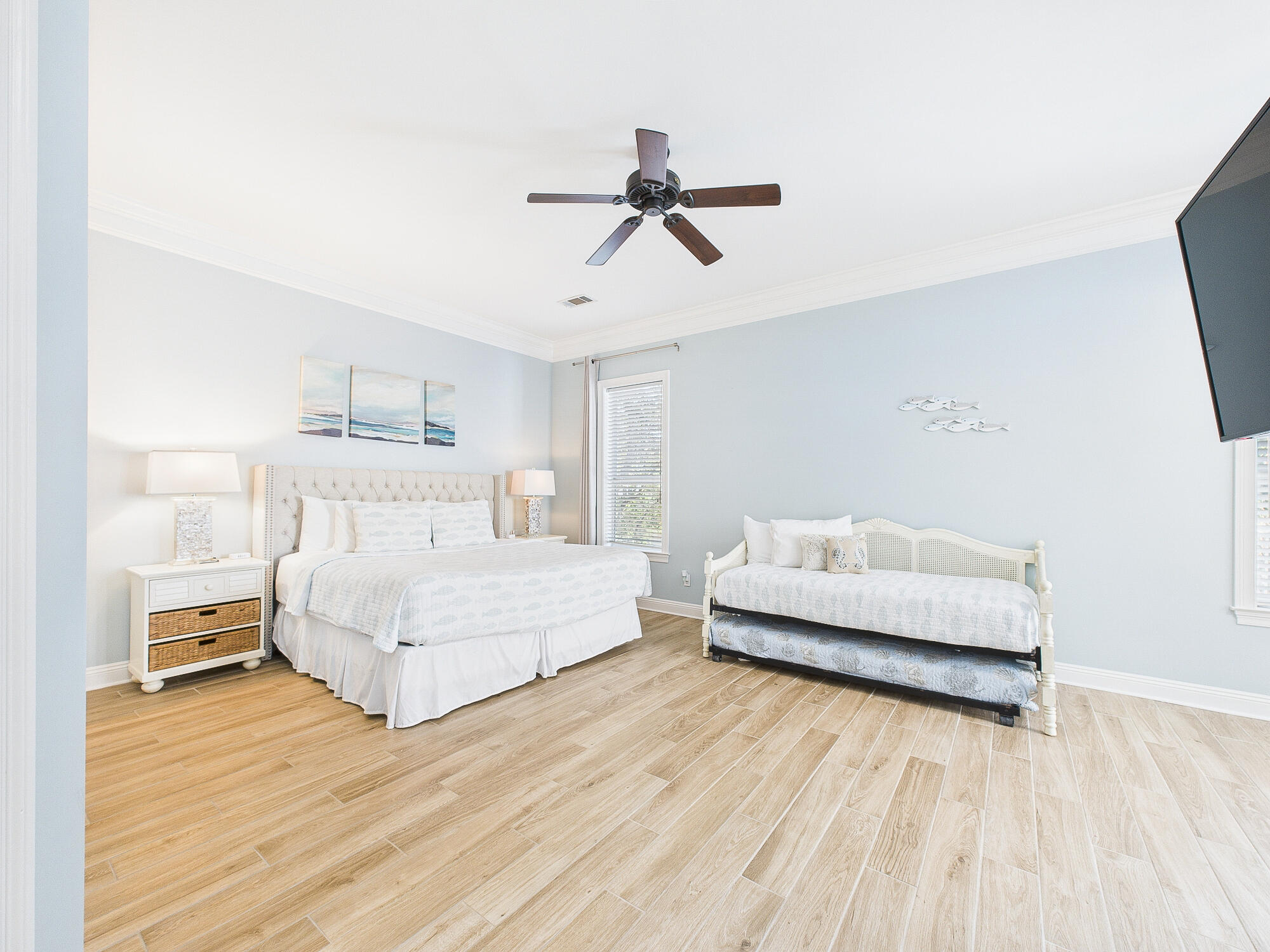 4634 Sunset Pointe Destin, FL 32541 - Photo 25 of 68 a bedroom with a bed and a wooden floor