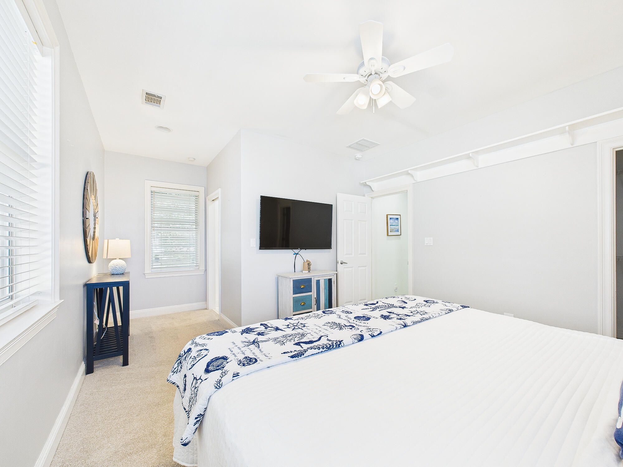 4634 Sunset Pointe Destin, FL 32541 - Photo 34 of 68 a bedroom with a bed and a flat screen tv