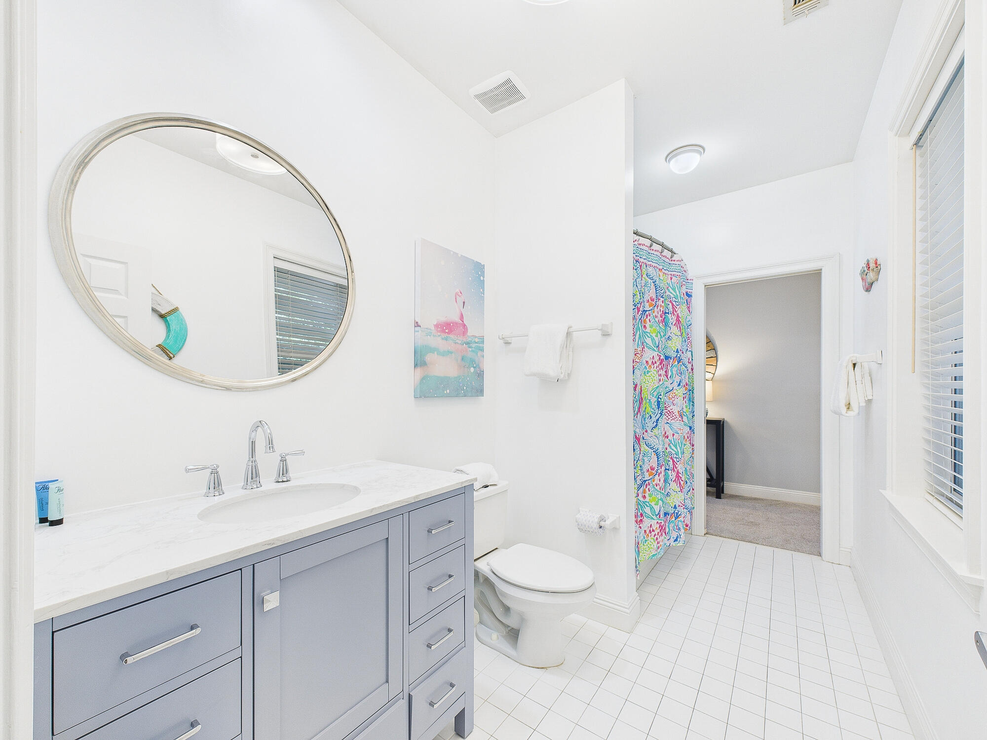 4634 Sunset Pointe Destin, FL 32541 - Photo 37 of 68 a bathroom with a sink mirror and toilet