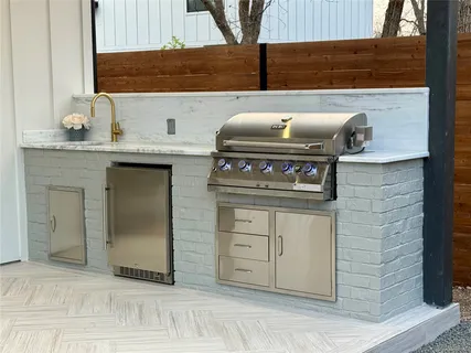 a kitchen with a stove and cabinets