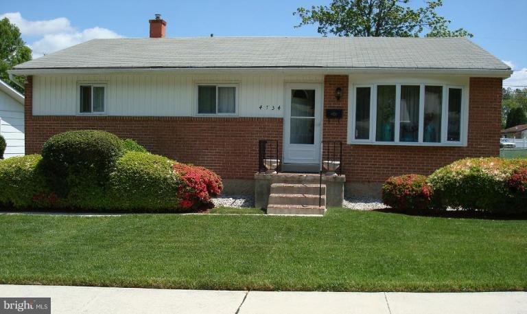 4734 Byron Road Windsor Mill, MD 21244 - Photo 1 of 10 a front view of a house with a garden