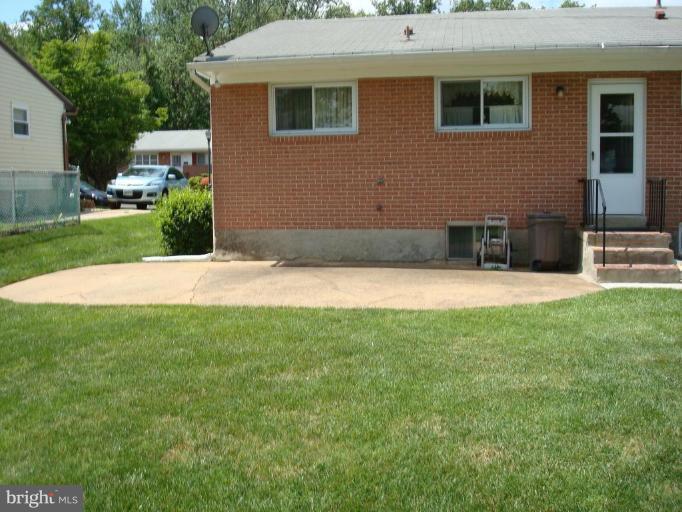4734 Byron Road Windsor Mill, MD 21244 - Photo 9 of 10 a view of a house with a yard
